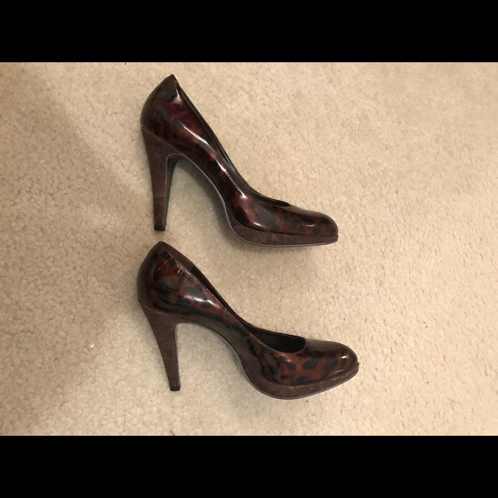 Stylish brown patent leather pumps with cork heel